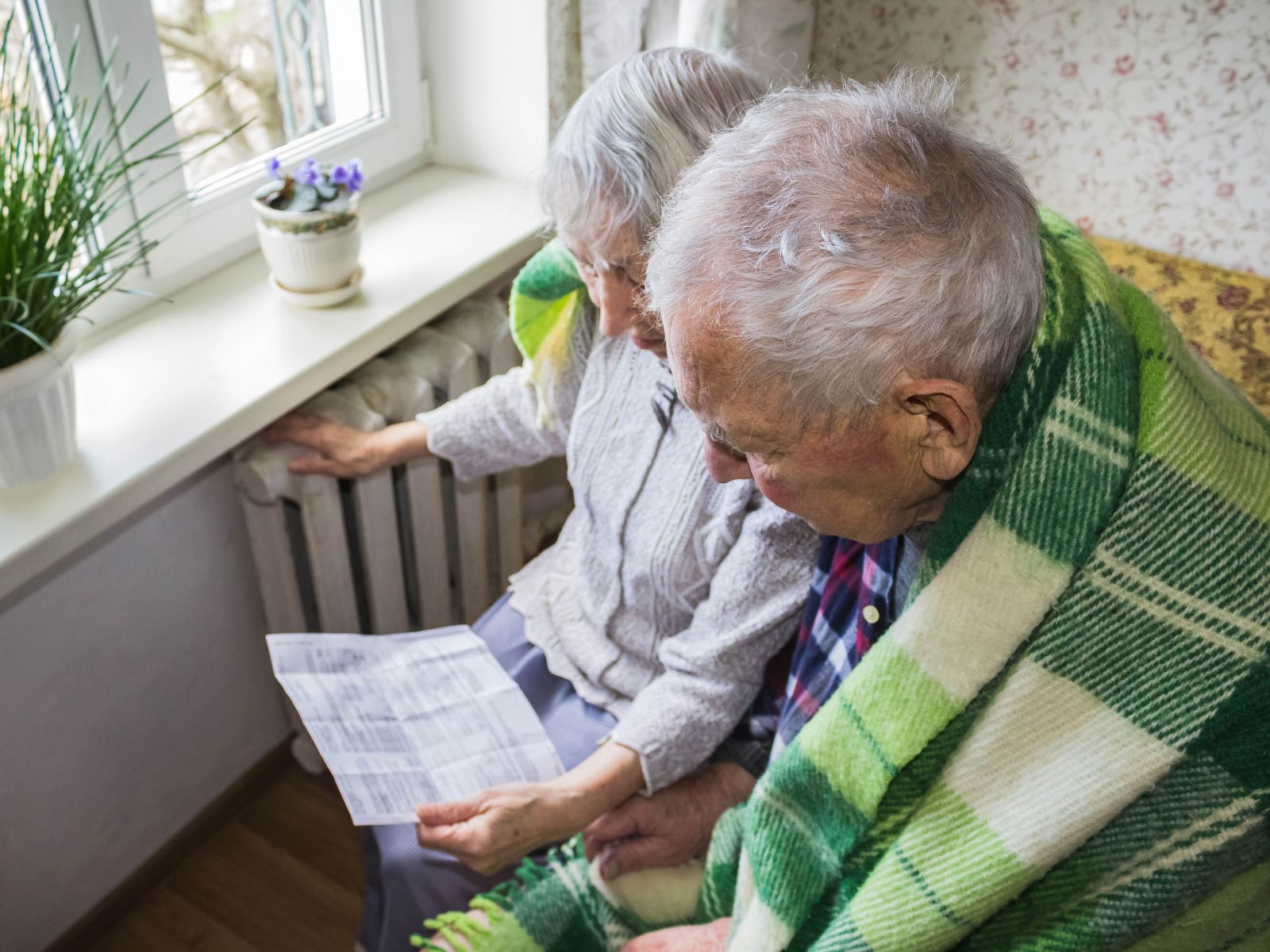 energy-old-couple-with-a-bill-and-a-blanket About Us